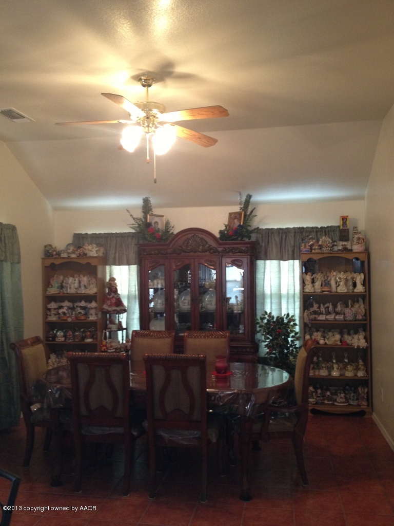 4801 Nimbus Lane Amarillo, TX 79110 - Photo 14 of 40 a view of a dining room with furniture