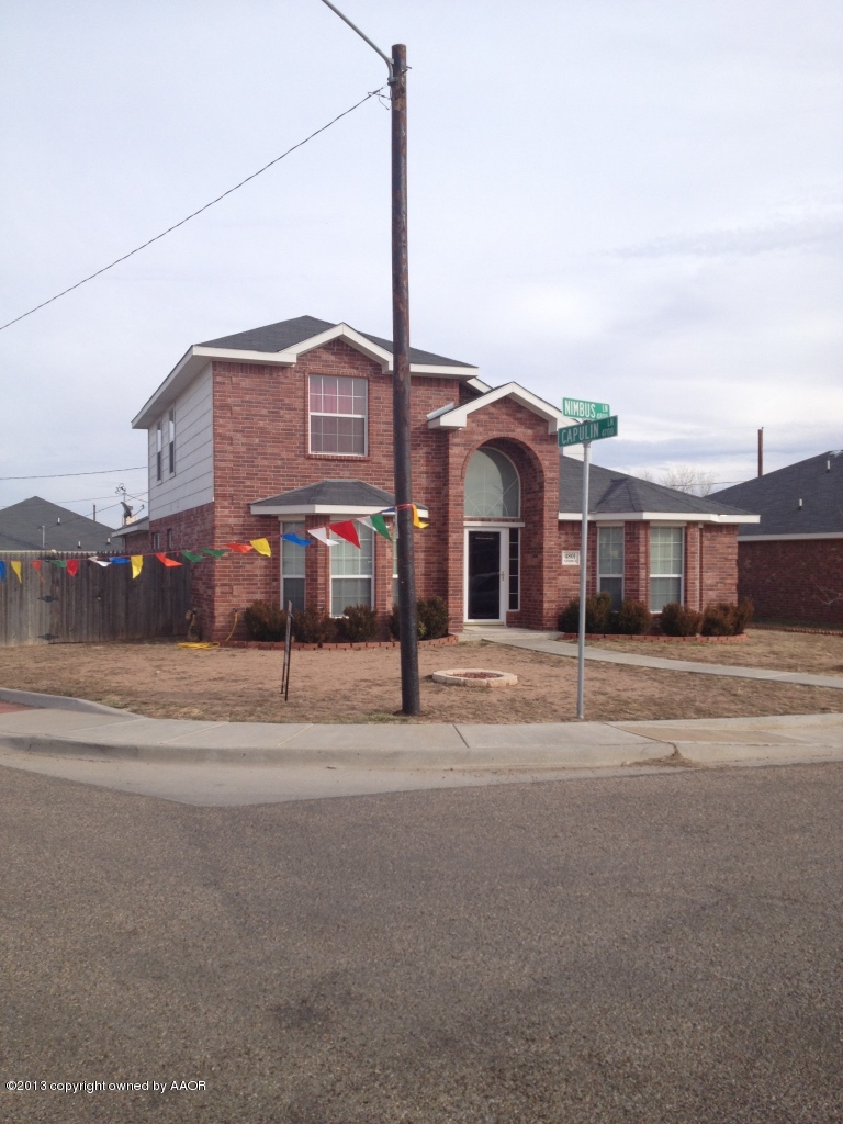 4801 Nimbus Lane Amarillo, TX 79110 - Photo 2 of 40 a front view of a building with a street