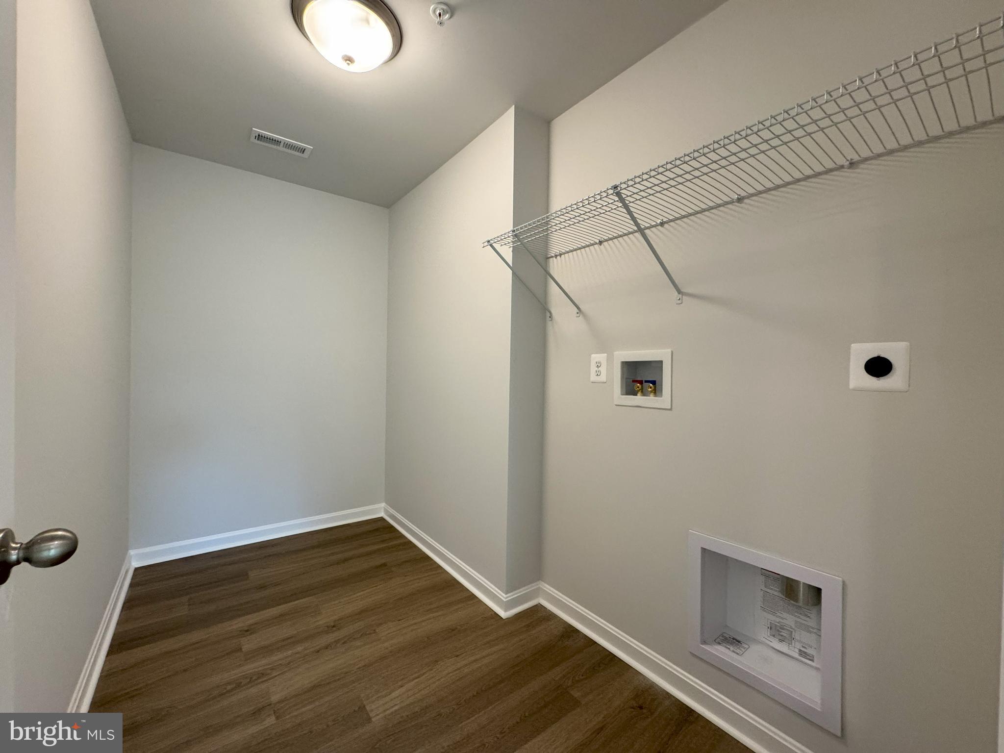 11306 H G Trueman Road Lusby, MD 20657 - Photo 13 of 33 a view of room with wooden floor