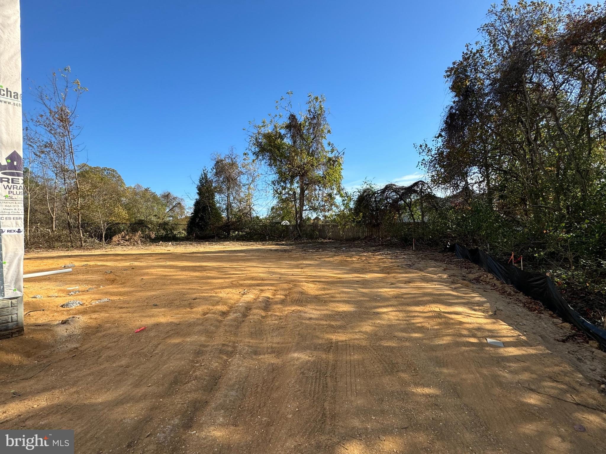 11306 H G Trueman Road Lusby, MD 20657 - Photo 28 of 33 a view of a yard with an trees