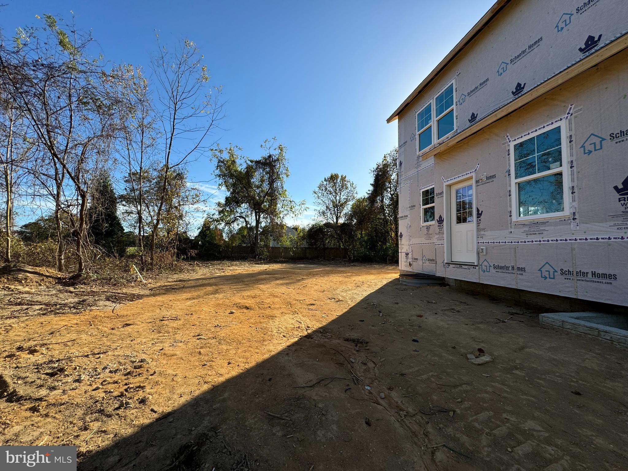 11306 H G Trueman Road Lusby, MD 20657 - Photo 29 of 33 a view of a house with backyard and trees