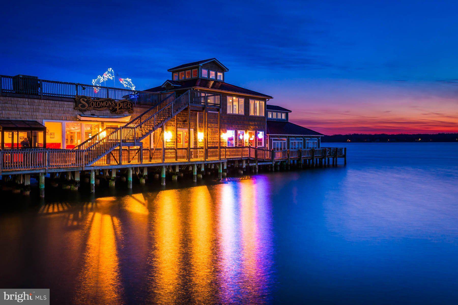 11306 H G Trueman Road Lusby, MD 20657 - Photo 31 of 33 a front view of a house with swimming pool
