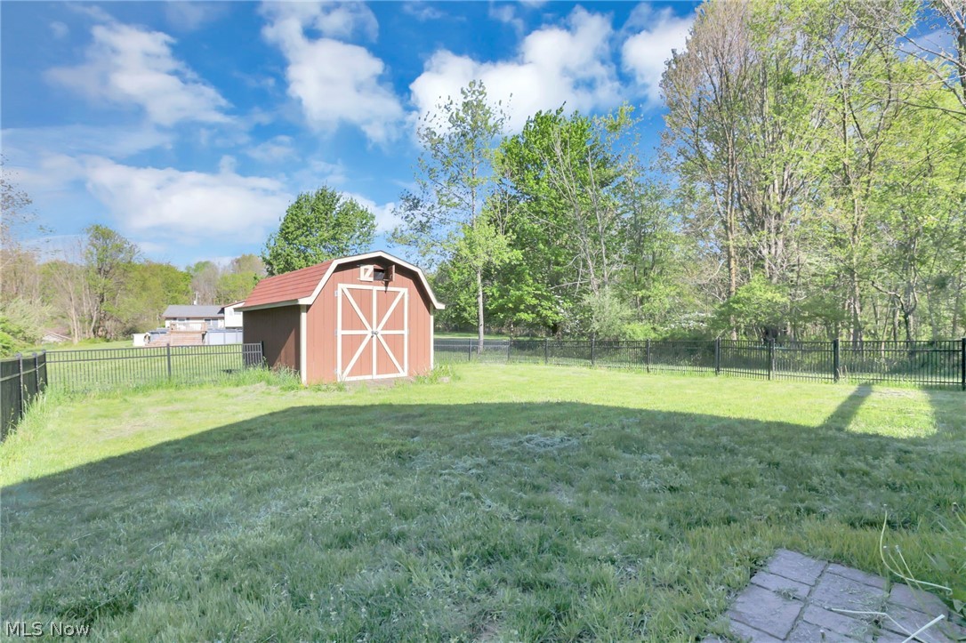 14953 King Road Howard, OH 43028 - Photo 37 of 40 Yard is fenced-in with wrought-iron fence and includes 10x10 shed
