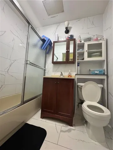 a view of house with wooden fence