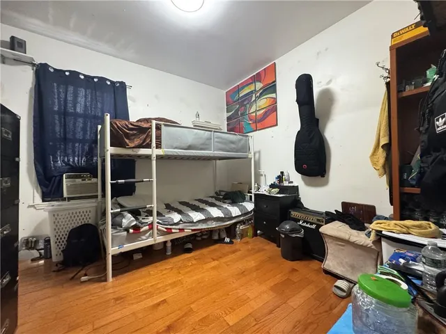 a bedroom with furniture and a fireplace