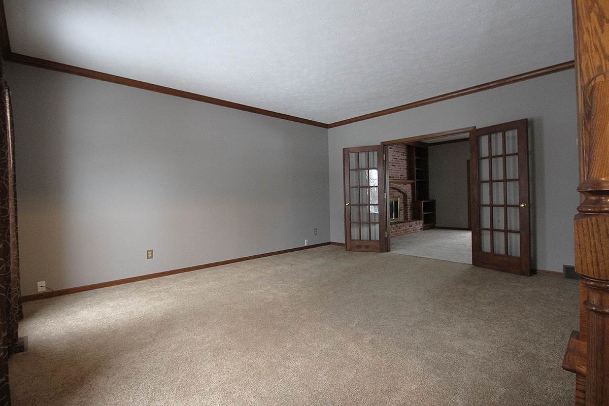 7097 Sentinel Road Rockford, IL 61107 - Photo 10 of 25 an empty room with entrance and door