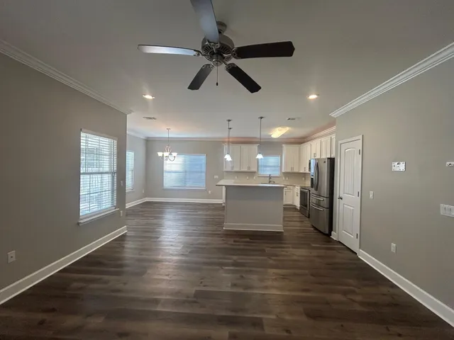 a view of kitchen and windows