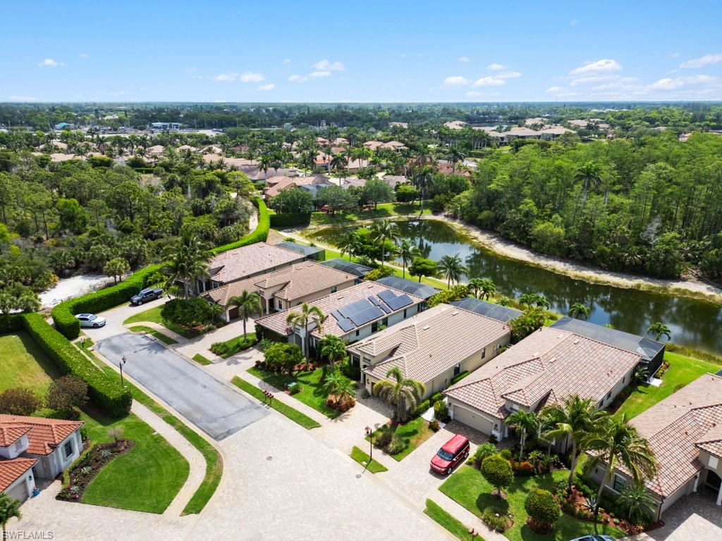 9522 Piacere Way Naples, FL 34113 - Photo 27 of 48 Drone / aerial view with a water view and a residential view