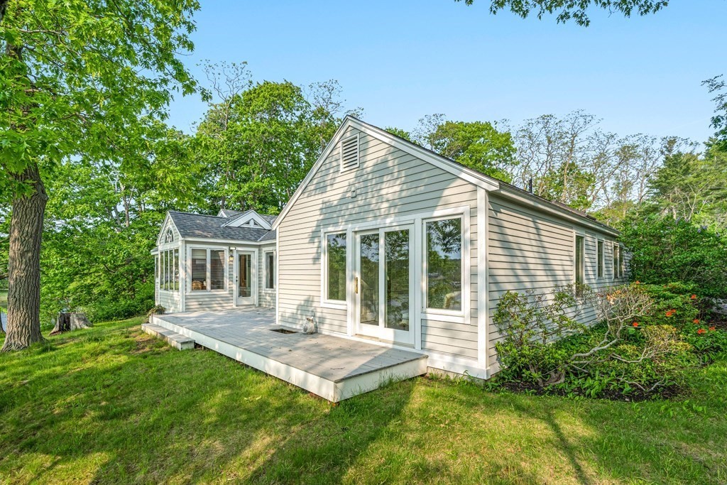 9 Proctor Street Manchester, MA 01944 - Photo 42 of 42 a front view of house with yard and green space