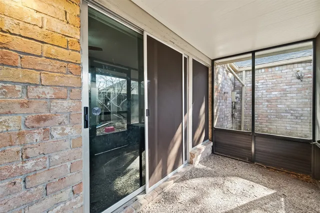 a view of entryway with wooden floor and a rug