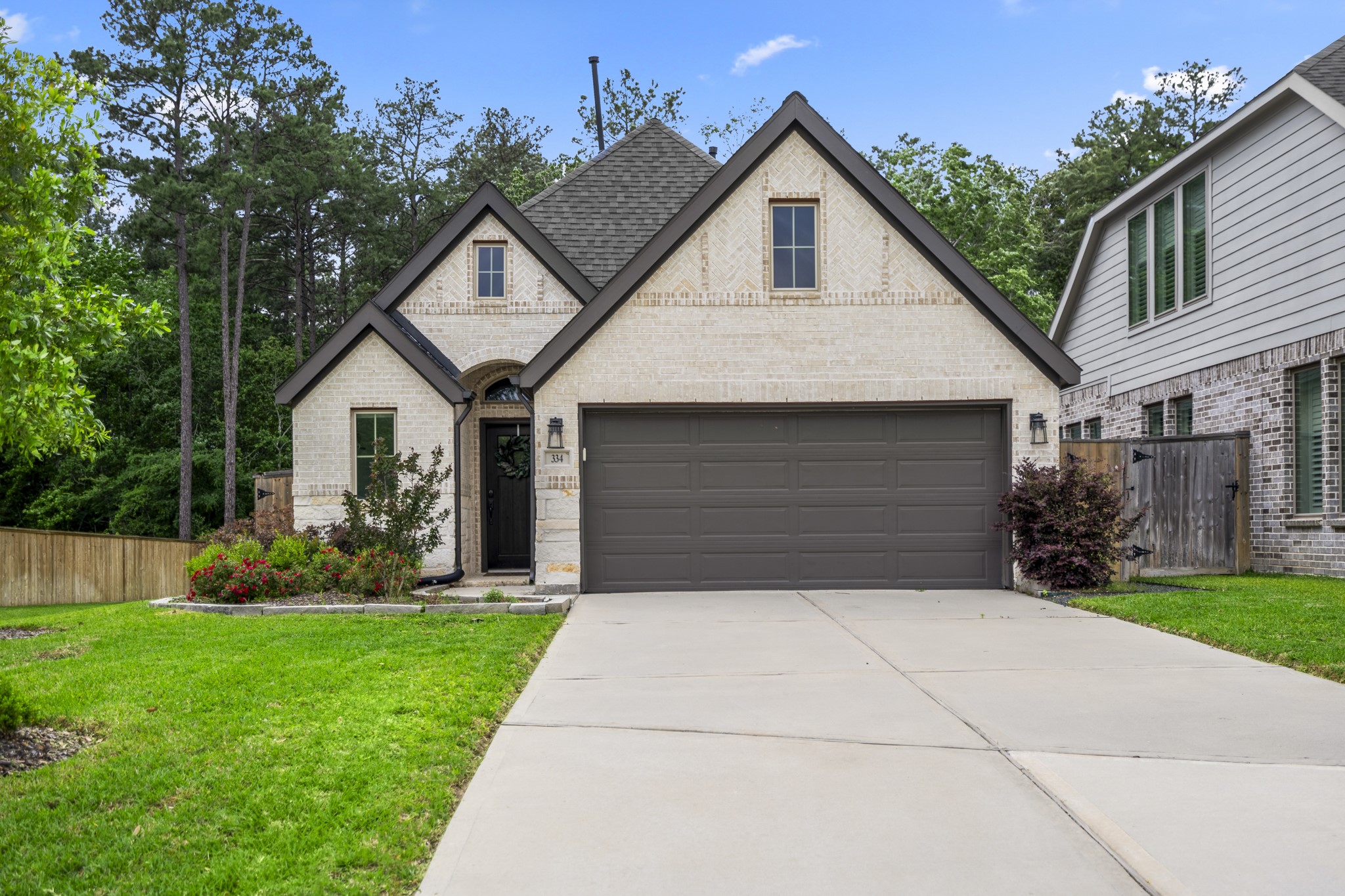 334 Topper Pines Drive Montgomery, TX 77316 - Photo 1 of 49 Welcome home to 334 Topper Pines Dr in The Crest at Woodforest, where the greenbelt backdrop is just one of the details that makes this home feel easy to settle into.