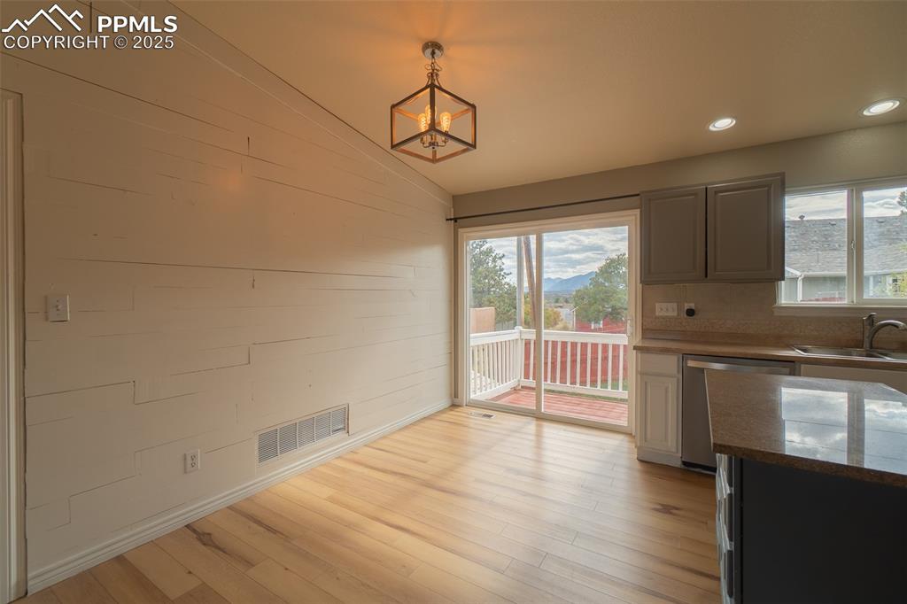 863 Circle Road Palmer Lake, CO 80133 - Photo 22 of 48 a view of an empty room with a window