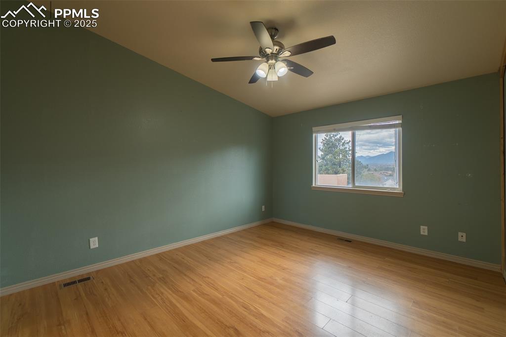 863 Circle Road Palmer Lake, CO 80133 - Photo 23 of 48 a view of an empty room with a window