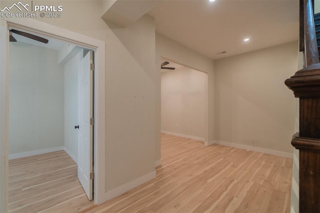 863 Circle Road Palmer Lake, CO 80133 - Photo 38 of 48 a view of hallway with wooden floor