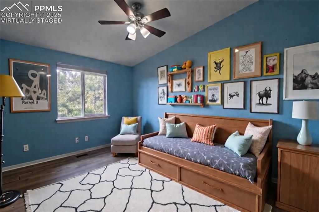 863 Circle Road Palmer Lake, CO 80133 - Photo 7 of 48 a living room with furniture and a window