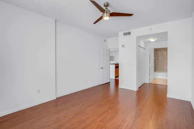 a view of a livingroom with wooden floor