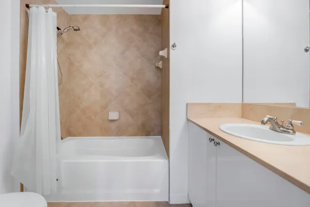 a bathroom with a sink and a bathtub