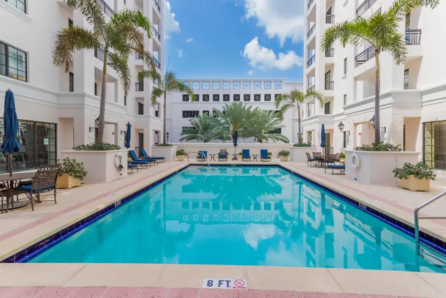 a view of a swimming pool with a patio