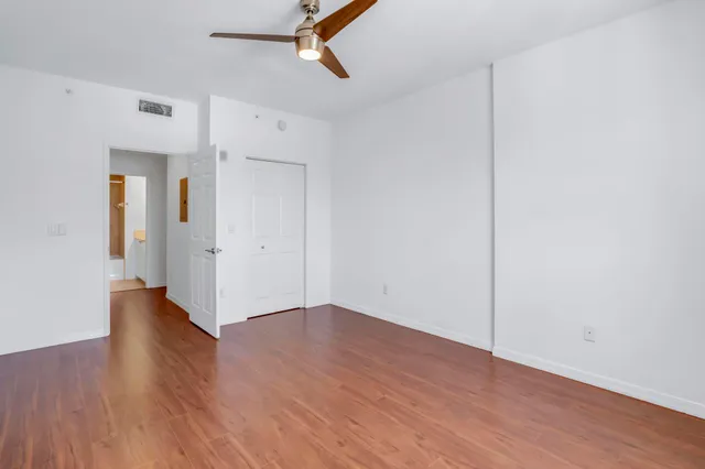 a bathroom with a glass shower door