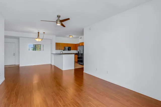 a view of a kitchen with a sink and a microwave