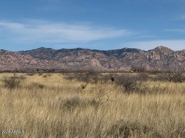 a view of a lake with mountains in the background