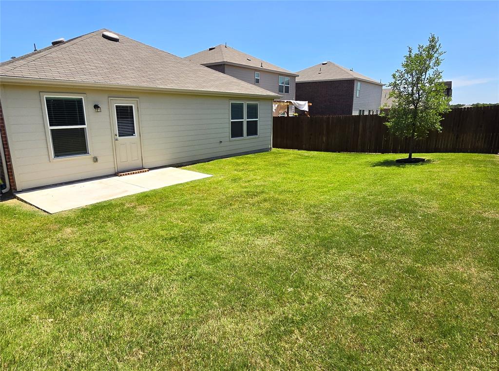 16029 Pemberly Lane Haslet, TX 76052 - Photo 16 of 19 a front view of house with yard and trees in the background