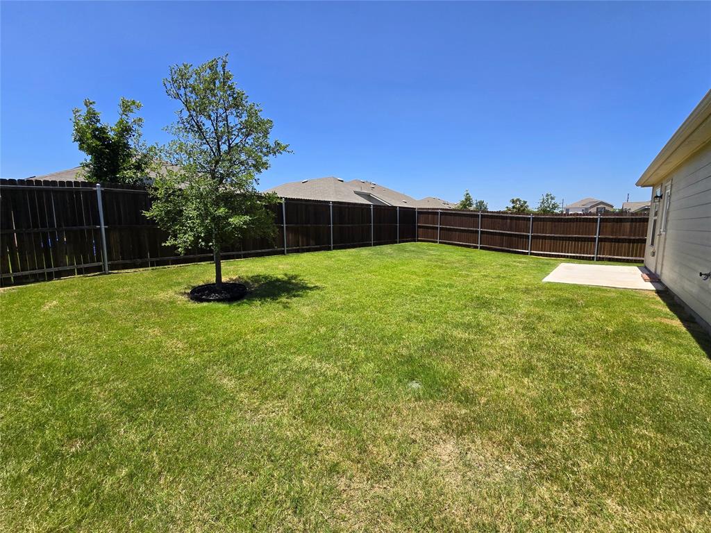 16029 Pemberly Lane Haslet, TX 76052 - Photo 17 of 19 a view of a garden with a slide