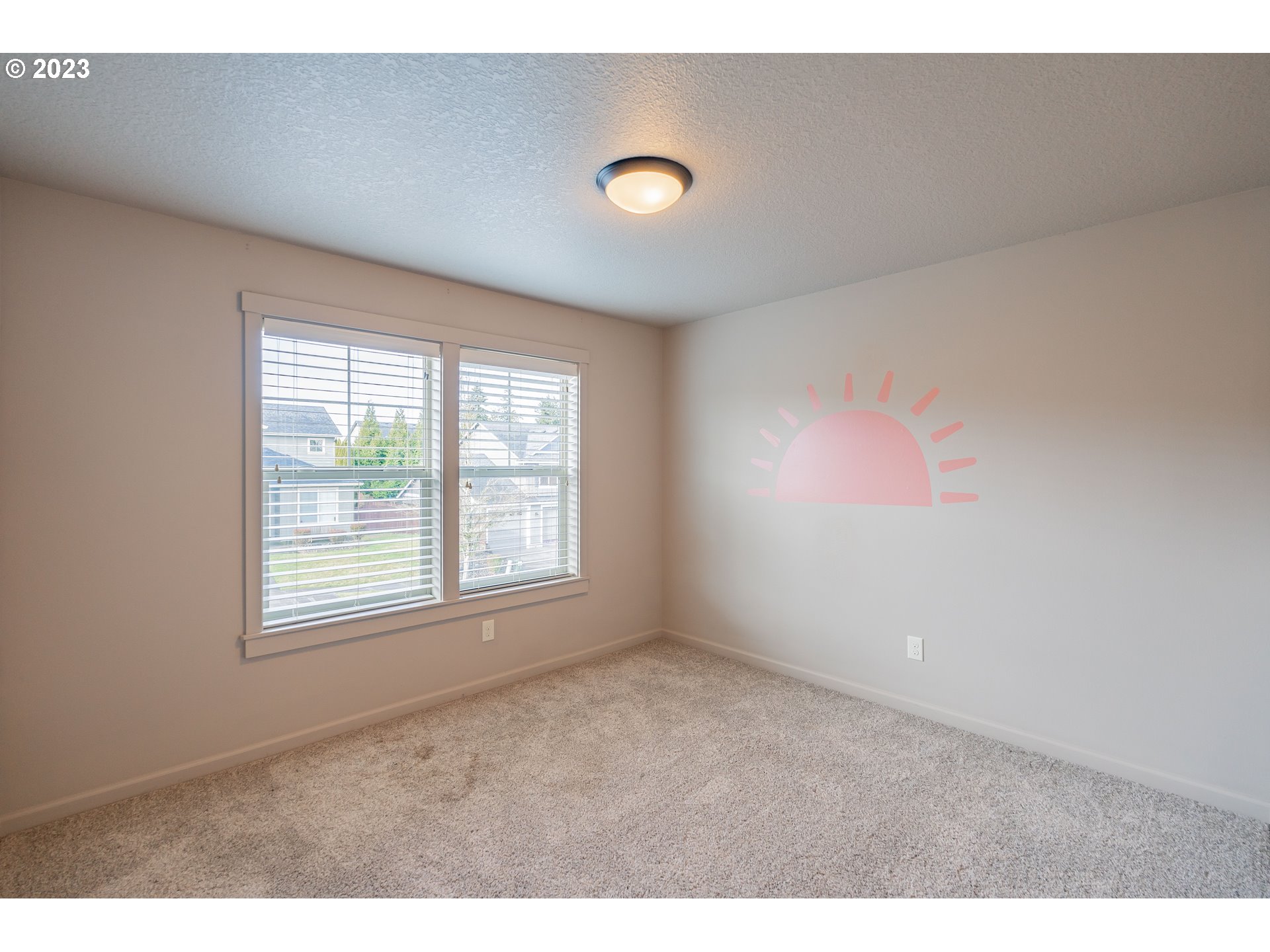 522 North 40th Avenue Ridgefield, WA 98642 - Photo 21 of 32 a view of an empty room with a window