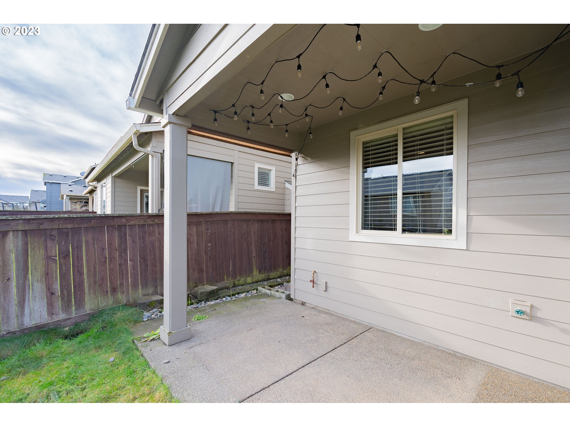 522 North 40th Avenue Ridgefield, WA 98642 - Photo 28 of 32 a view of house with backyard and wooden fence