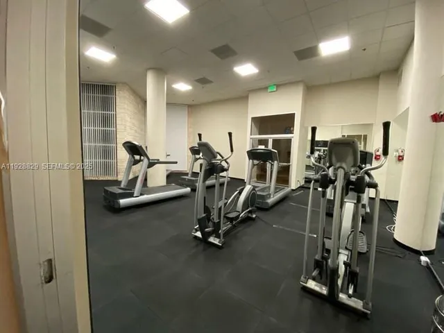 a view of a room with gym equipment