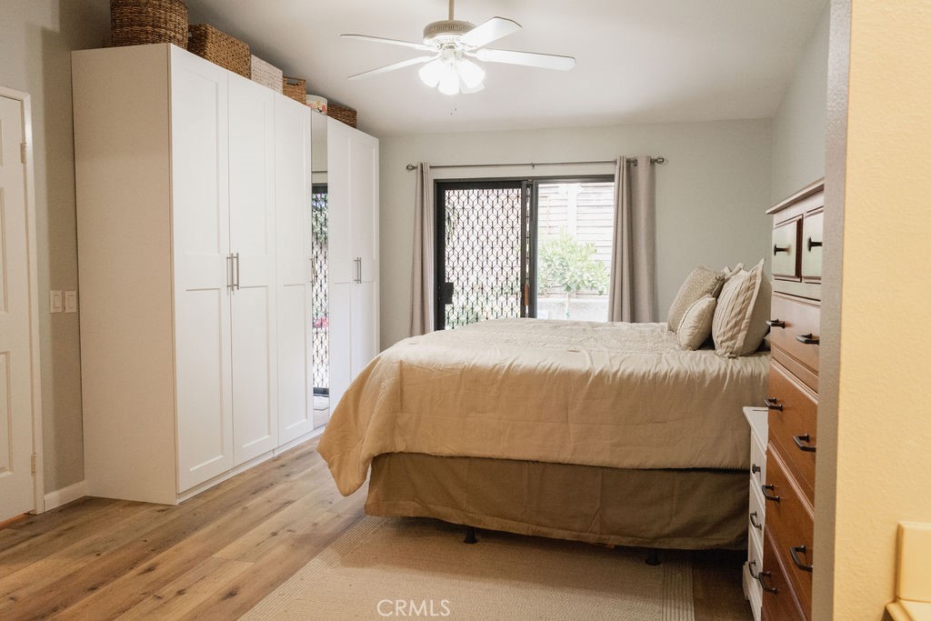 1917 Cobblefield Way Glendora, CA 91740 - Photo 21 of 45 a spacious bedroom with a bed and a chandelier