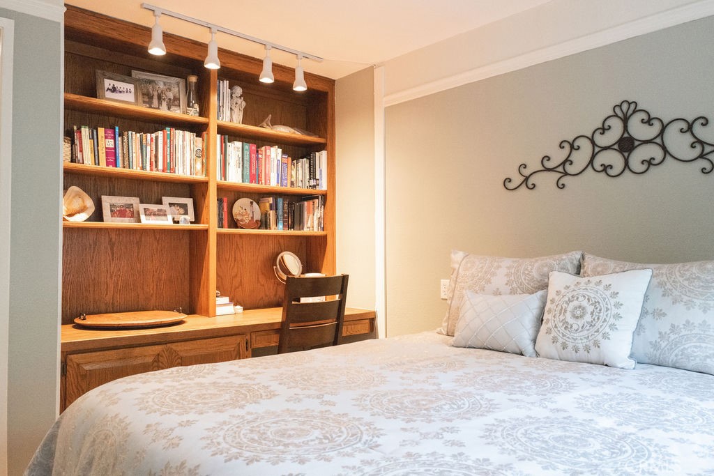 1917 Cobblefield Way Glendora, CA 91740 - Photo 27 of 45 a bedroom with a bed and a book shelf