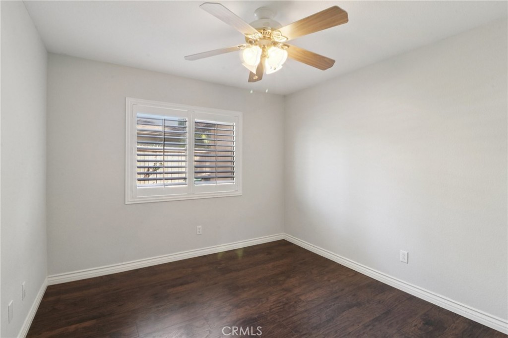 4310 Forest Ranch Way Oceanside, CA 92057 - Photo 19 of 50 wooden floor in an empty room with a window