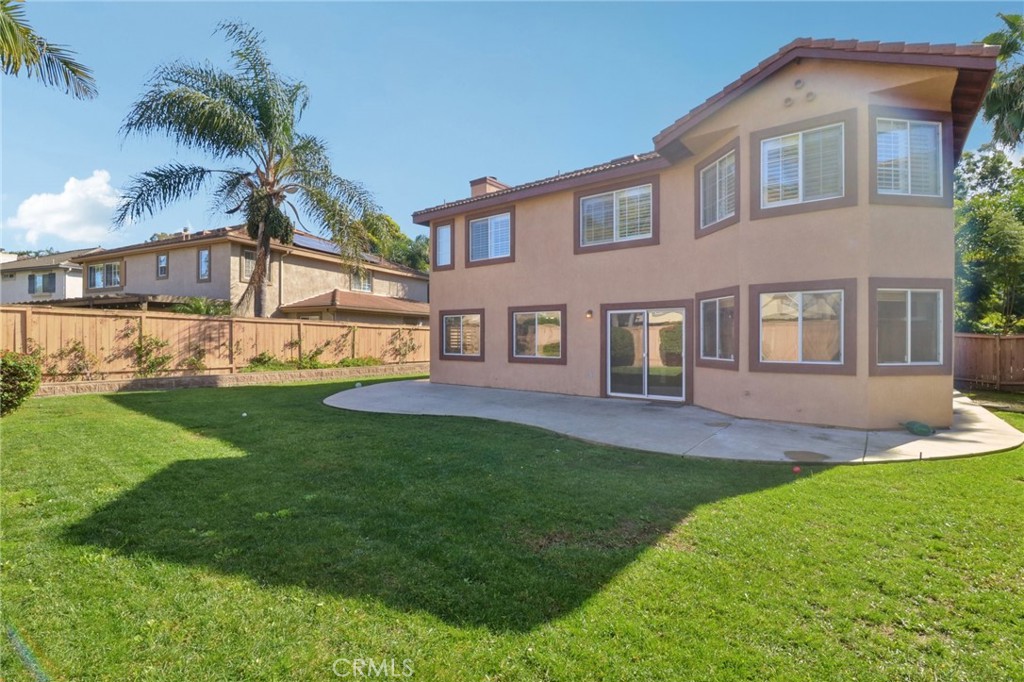 4310 Forest Ranch Way Oceanside, CA 92057 - Photo 35 of 50 a view of a yard in front of a house