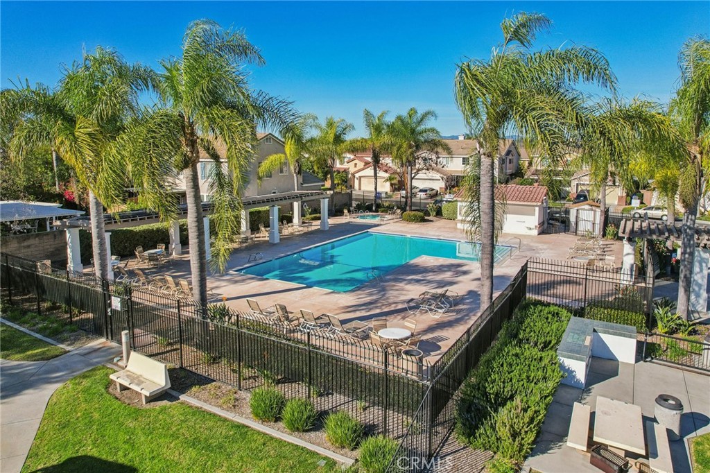 4310 Forest Ranch Way Oceanside, CA 92057 - Photo 49 of 50 a view of a backyard with couches plants and palm tree