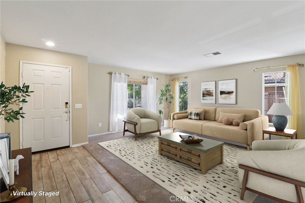 4310 Forest Ranch Way Oceanside, CA 92057 - Photo 6 of 50 a living room with furniture and wooden floor