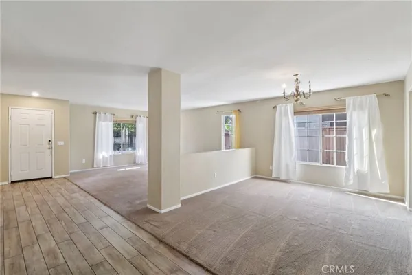 a view of livingroom with hardwood floor and window