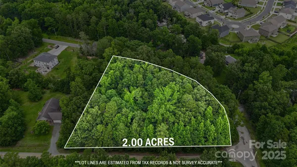 an aerial view of a house with a garden