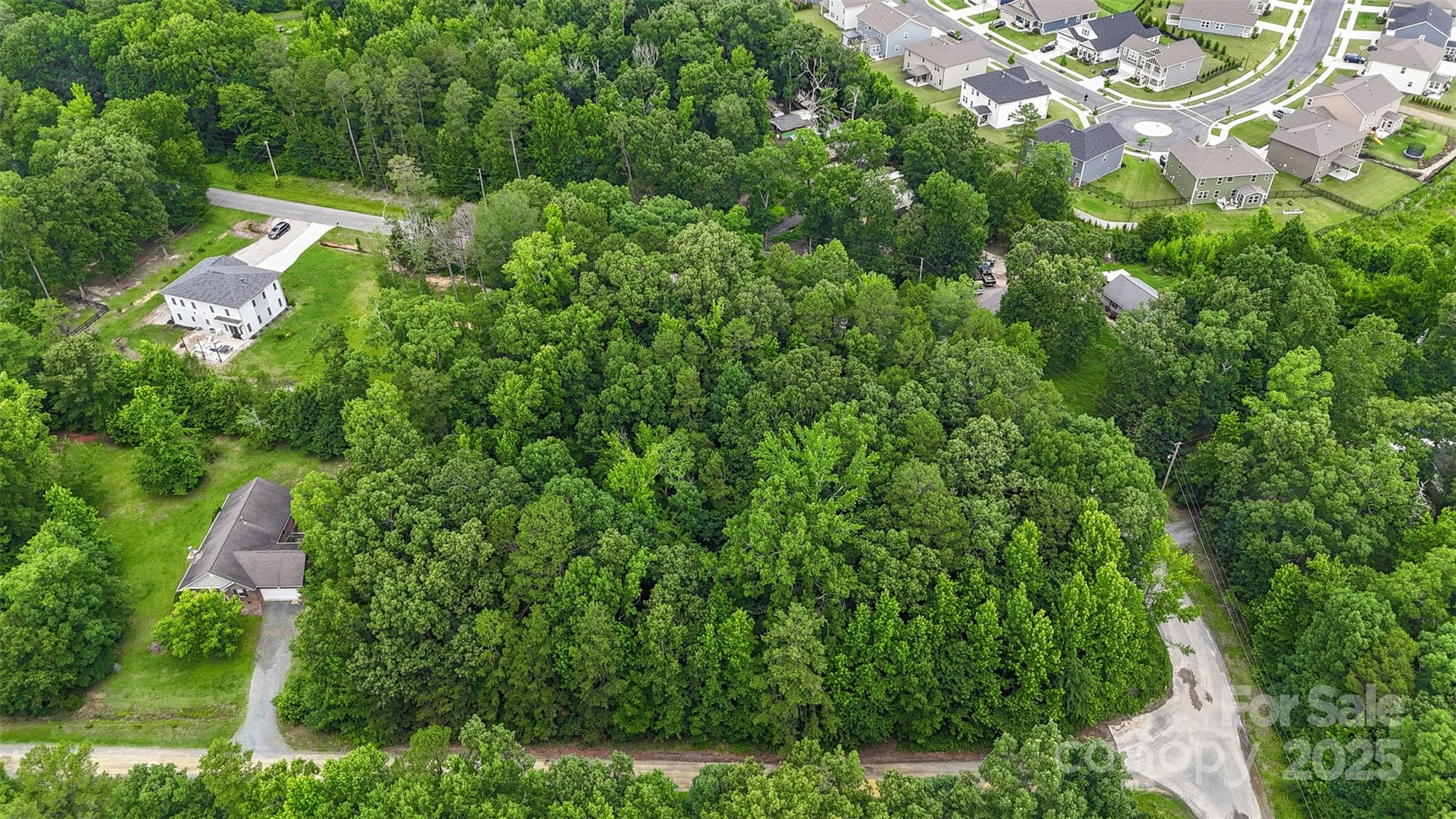 24 Moser Circle Indian Trail, NC 28079 - Photo 16 of 17 an aerial view of residential house with outdoor space and trees all around