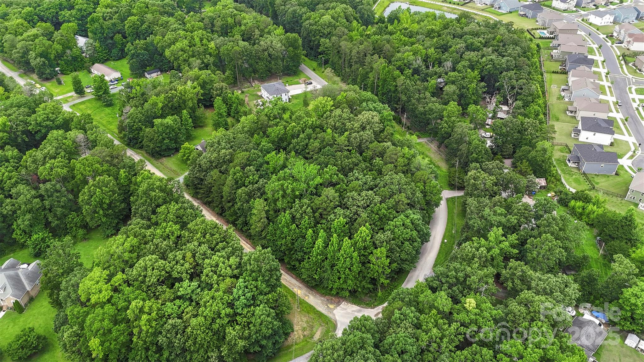 24 Moser Circle Indian Trail, NC 28079 - Photo 4 of 17 an aerial view of residential house with space and trees all around