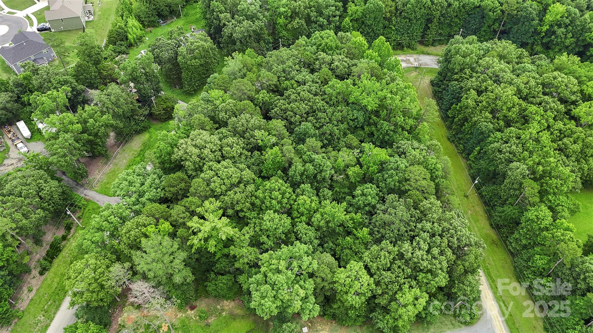 24 Moser Circle Indian Trail, NC 28079 - Photo 5 of 17 an aerial view of residential house with outdoor space and trees all around