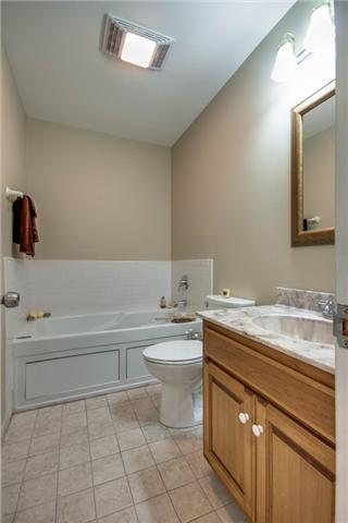 7378 Walker Road Fairview, TN 37062 - Photo 11 of 20 Master bath. Whirlpool tub and tile. Neutral paint.