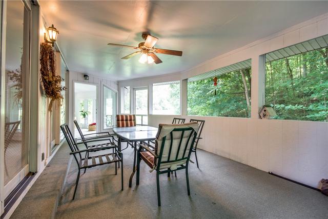 7378 Walker Road Fairview, TN 37062 - Photo 17 of 20 Screened porch with views of the woods.
