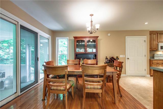 7378 Walker Road Fairview, TN 37062 - Photo 5 of 20 Dining area with hardwood floor and space for a large table. Opens to kitchen.