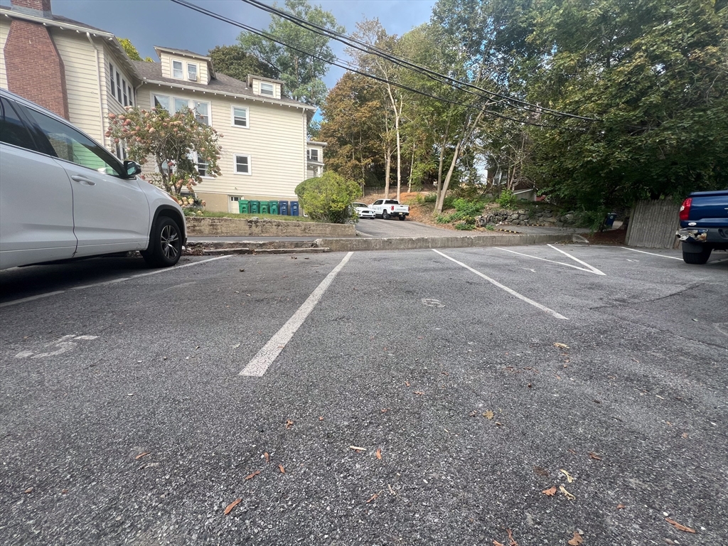 219 Commonwealth Avenue, Unit 21 Newton, MA 02467 - Photo 9 of 9 a view of street with parked cars