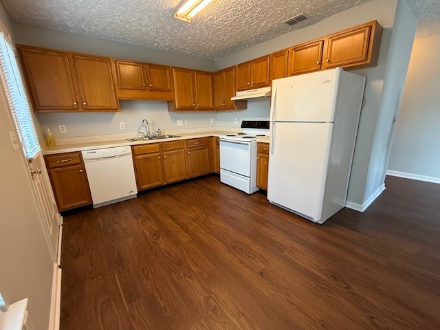 1538 Chariot Drive Murfreesboro, TN 37130 - Photo 4 of 9 a kitchen with sink a refrigerator and white stove top oven