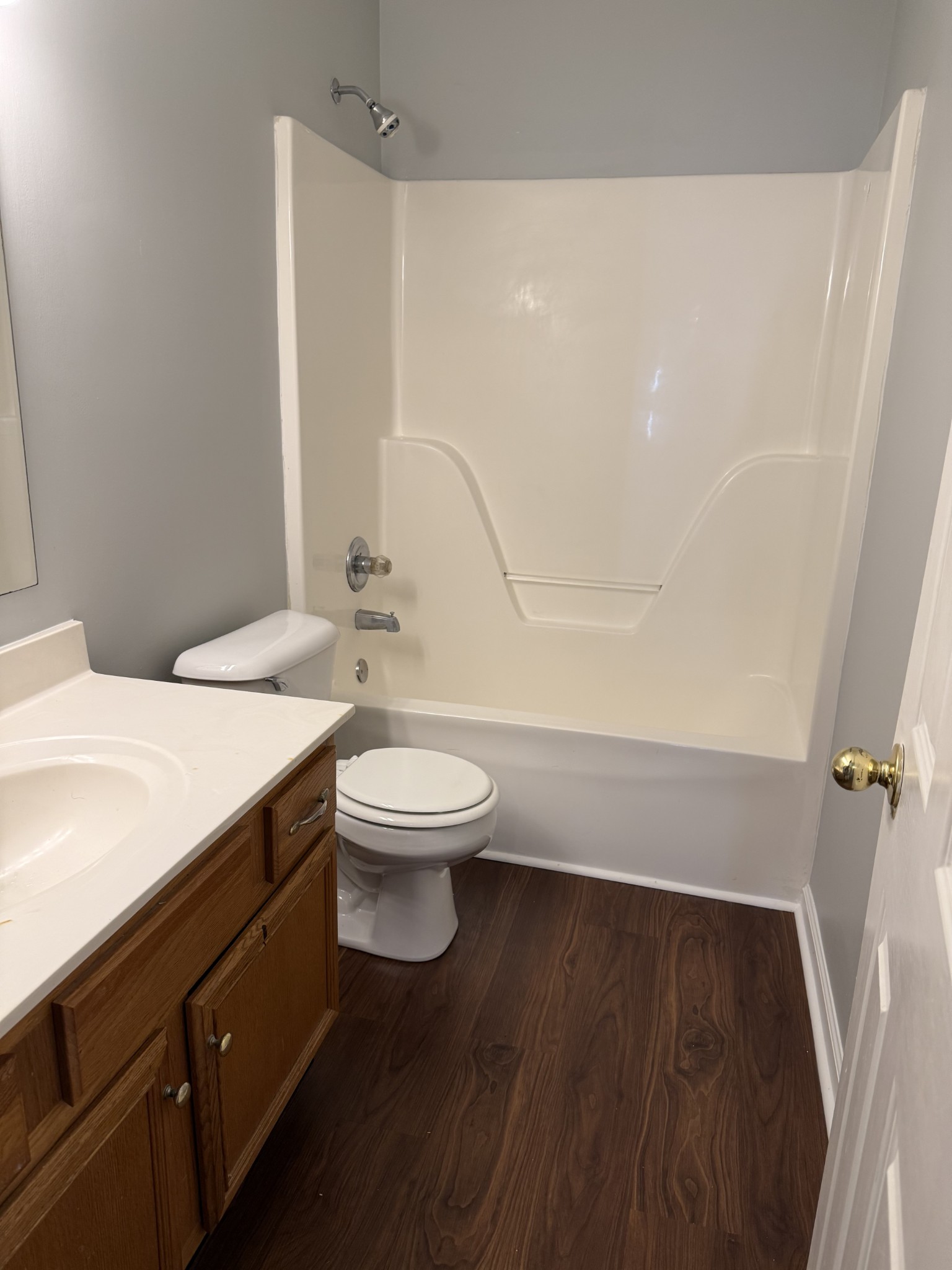 1538 Chariot Drive Murfreesboro, TN 37130 - Photo 8 of 9 a bathroom with a toilet a sink and bathtub