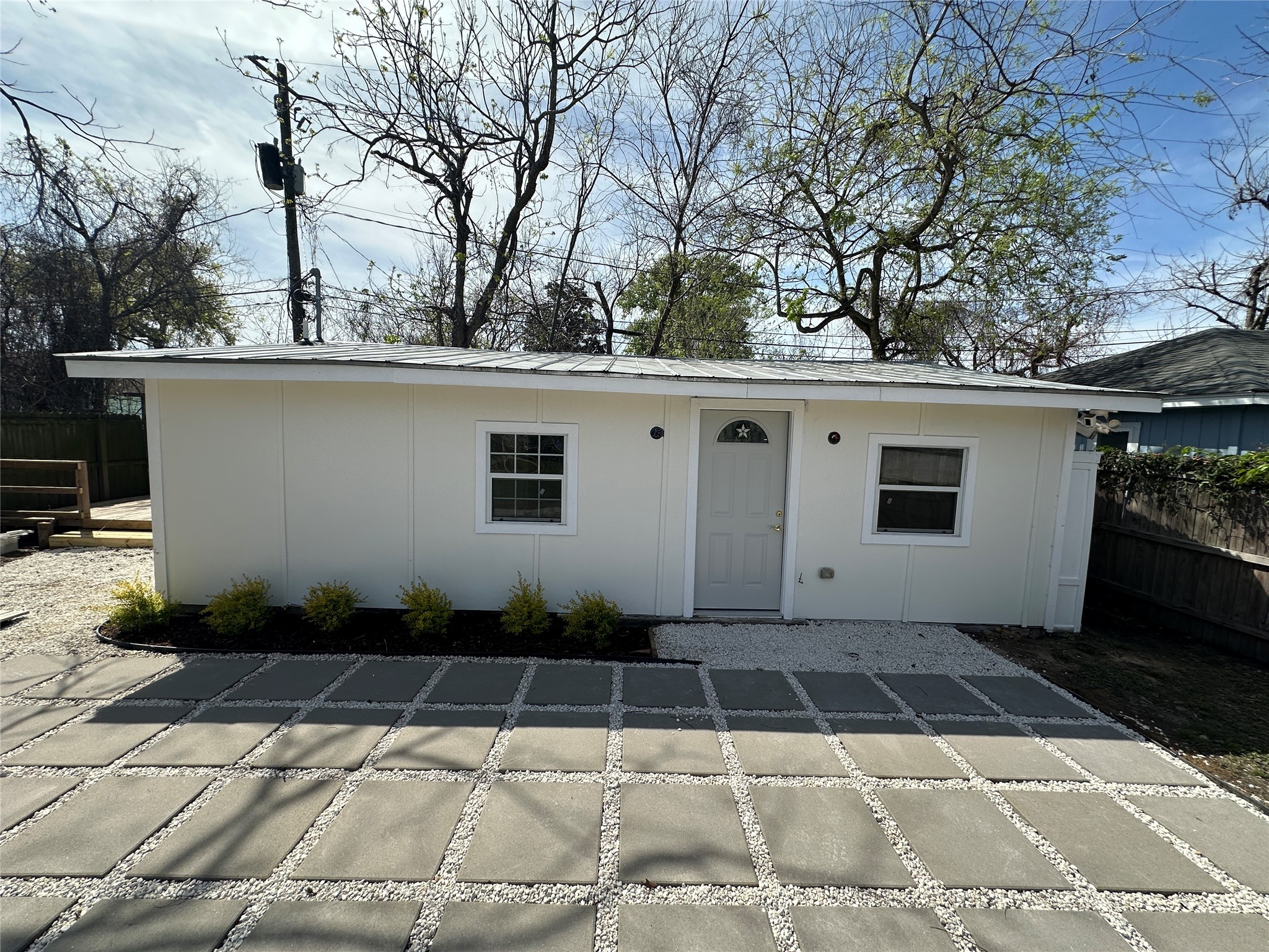 4109 Edison Street Houston, TX 77009 - Photo 2 of 8 a front view of a house with a garden