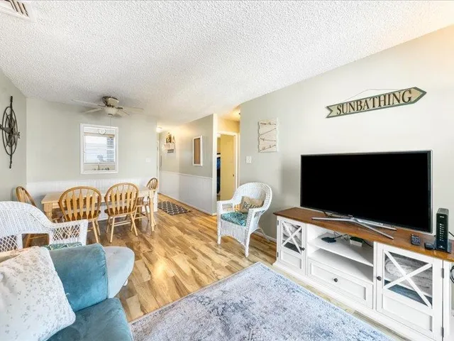 a bathroom with a sink a mirror and shower