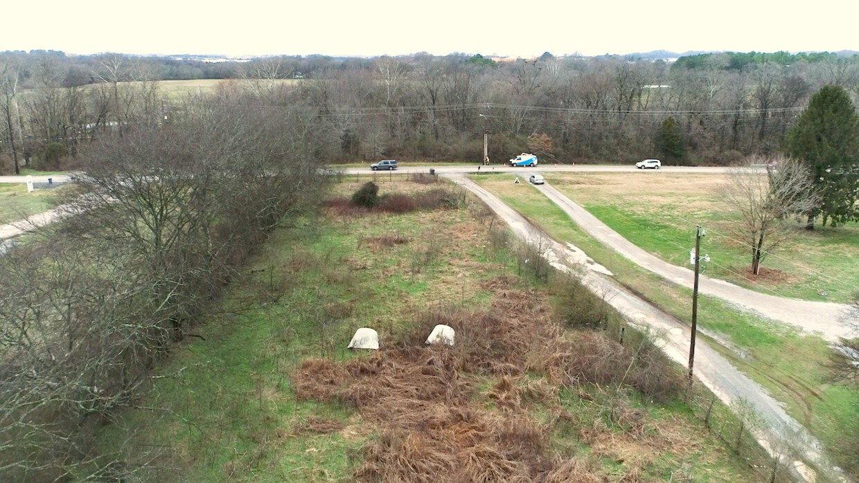 1009 Old Kedron Road Spring Hill, TN 37174 - Photo 12 of 13 a view of a backyard